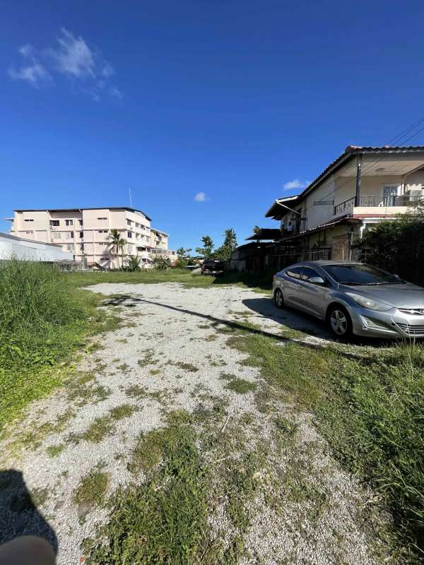 Flat vacant residential development site next to houses and apartments Betania Panama
