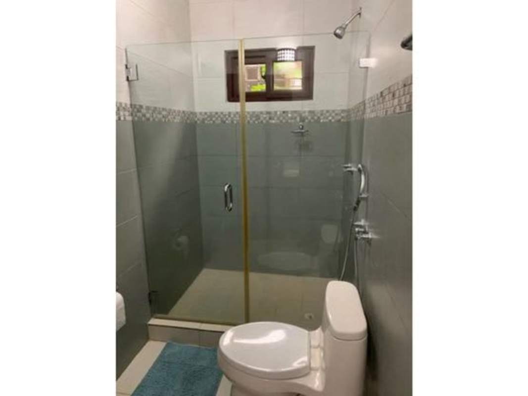 Private swimming pool with garden and terrace in house at Sunset Coast Costa Sur Panama