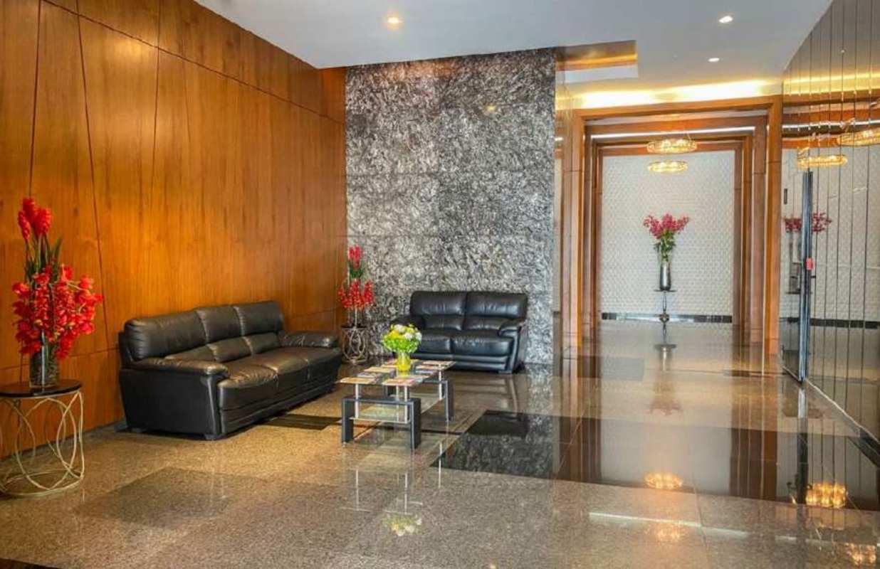 Waiting area luxury lobby black leather sofas Plaza Street Mall Panama
