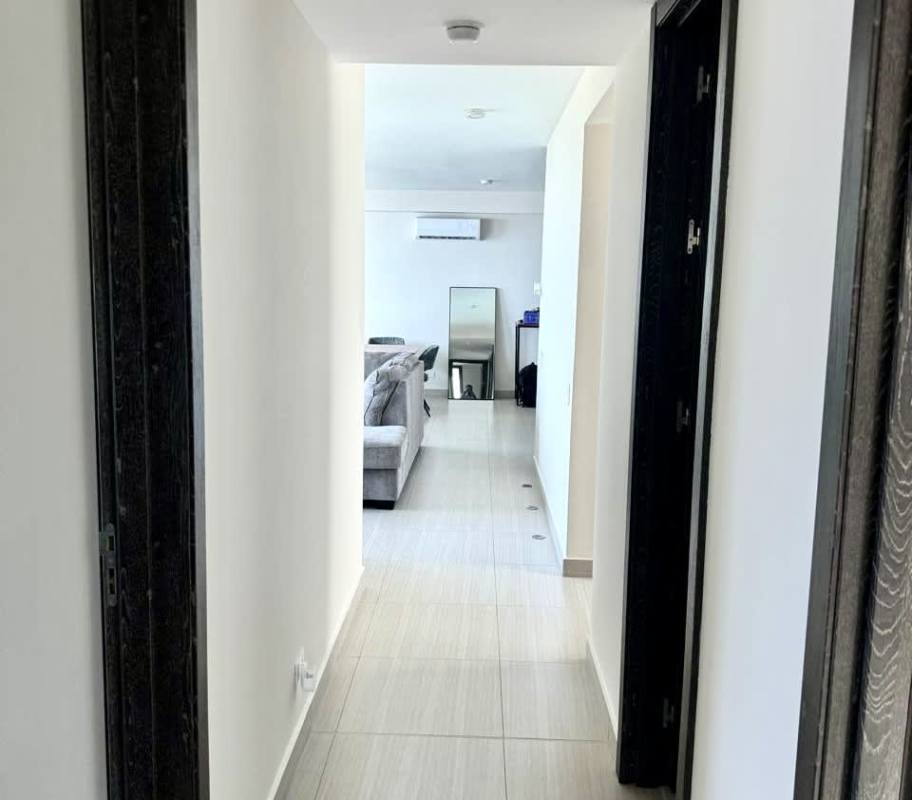 Elegant lobby entrance with reception desk at PH Asia Costa del Este