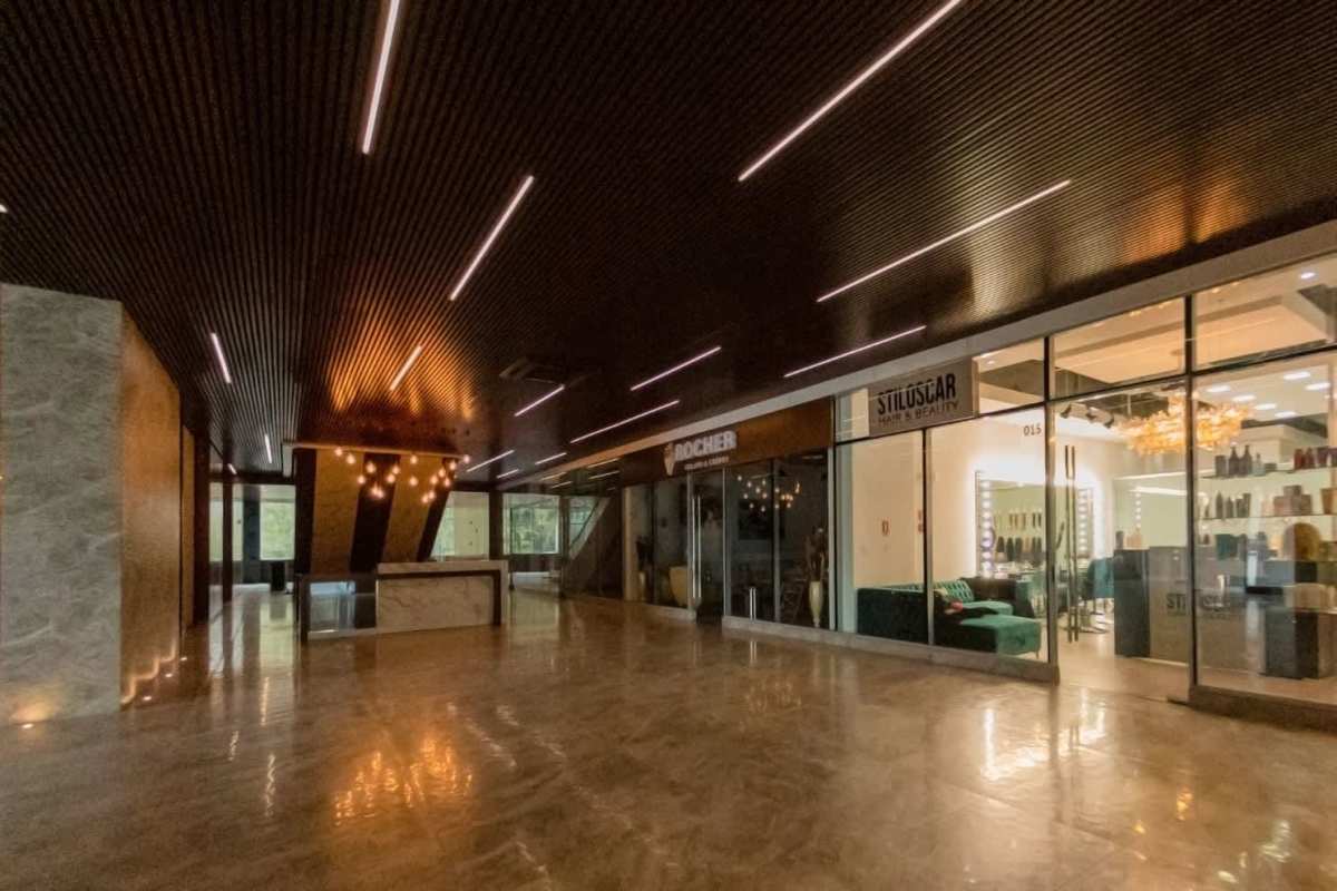 Modern retail corridor with marble flooring glass storefront Sunset Strip Mall San Francisco Panama