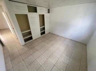 Simple white kitchen with cabinets ceramic floor rent to own home Panama