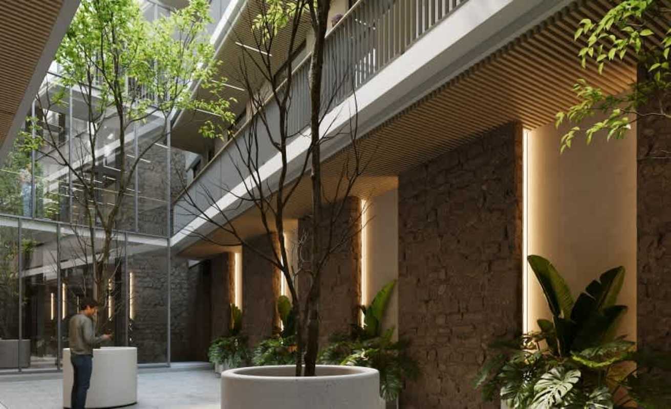 Interior courtyard with stone and vertical gardens inside colonial restoration Panama