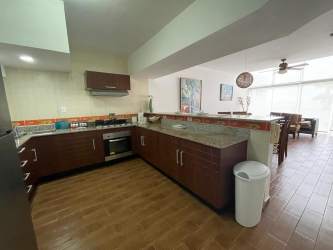 Open living dining area with balcony and ocean views Playa Farallón Panama