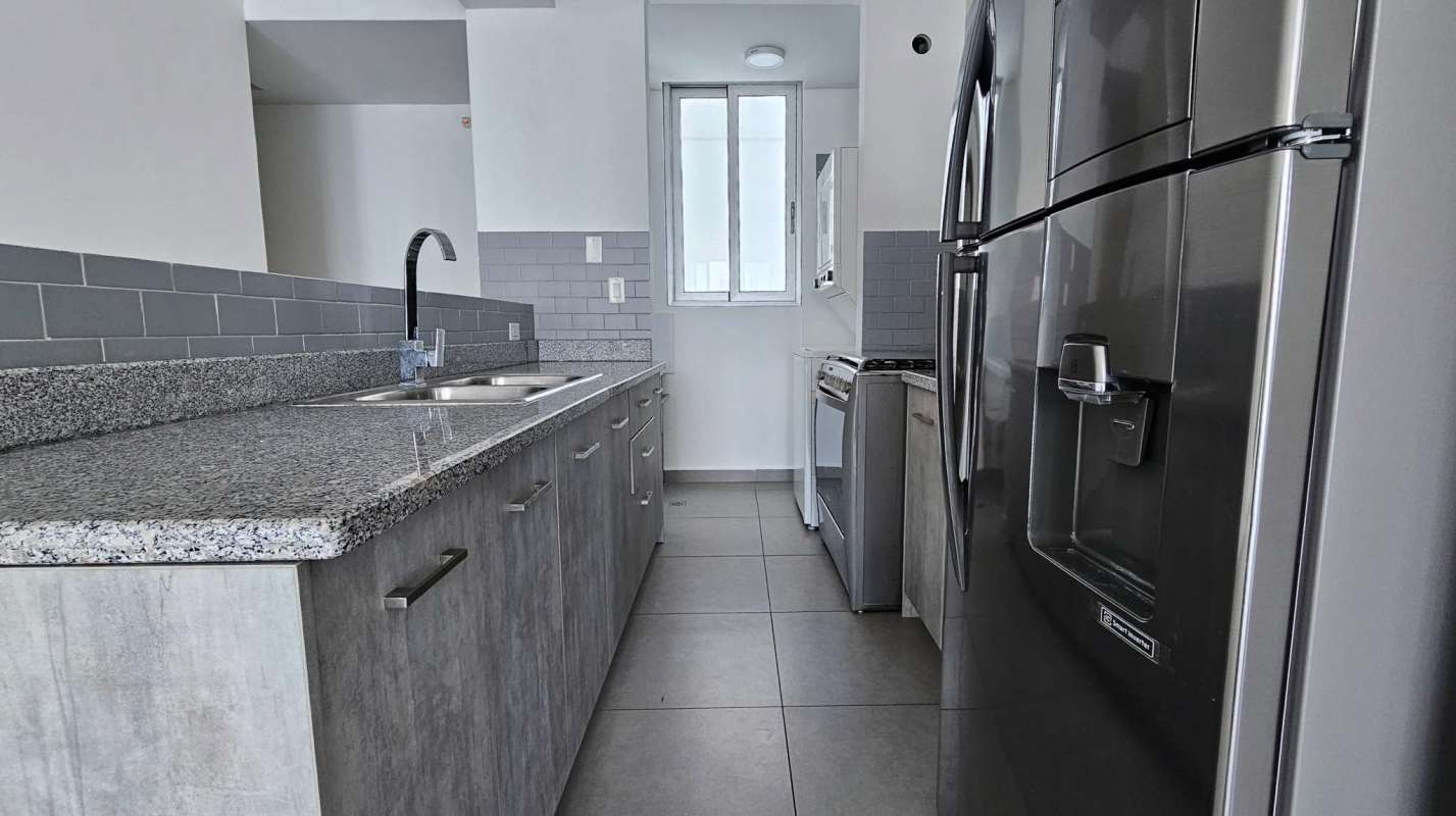 Bathroom with glass shower and stylish tile at PH Signature Point Panama City