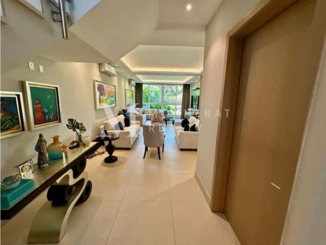 Spacious master suite with large windows overlooking golf course luxury house The Grove