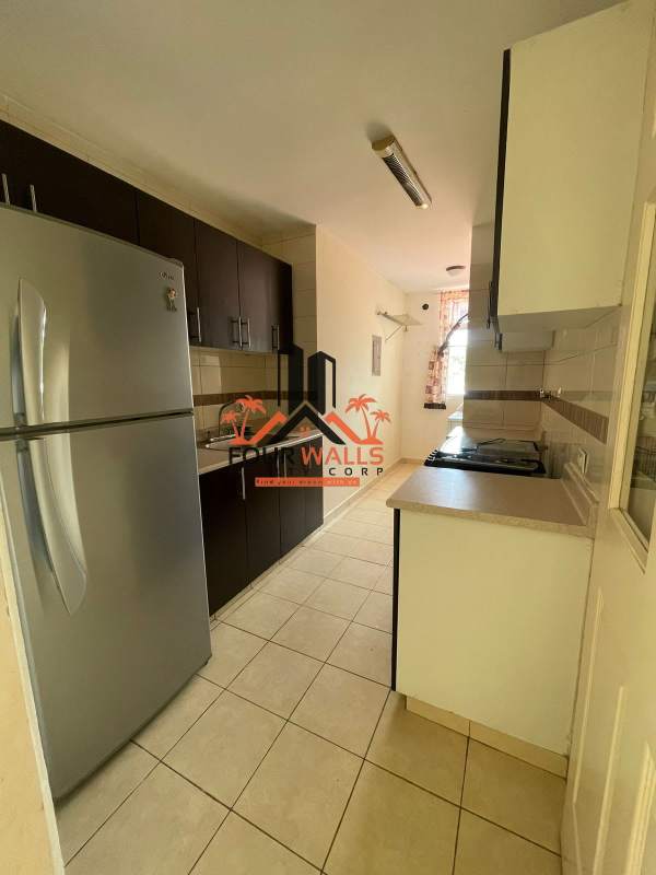 Bedroom with large window, closet space and tiled floors in PH Verde Azul El Ingenio Panama