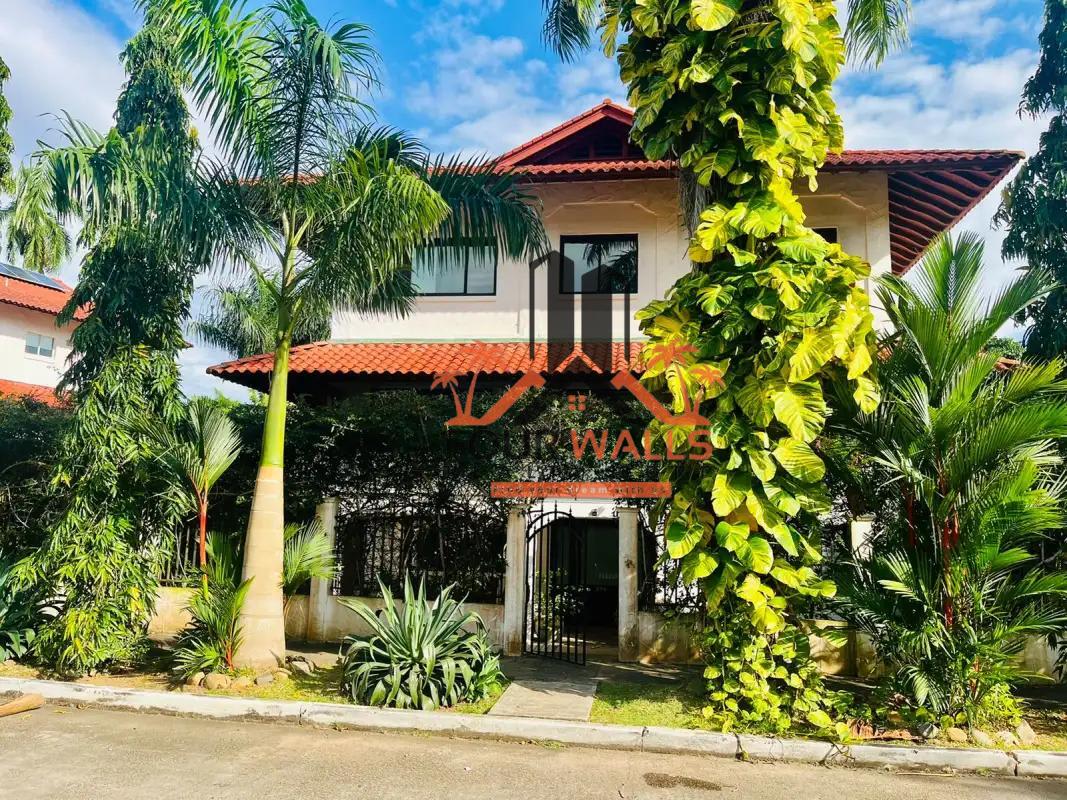 Outdoor private pool surrounded by tropical gardens in exclusive Albrook home Panama