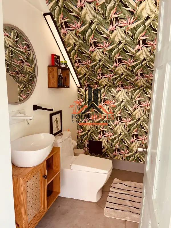 Fully equipped kitchen with granite, wood cabinetry, large island in luxury house Albrook Panama