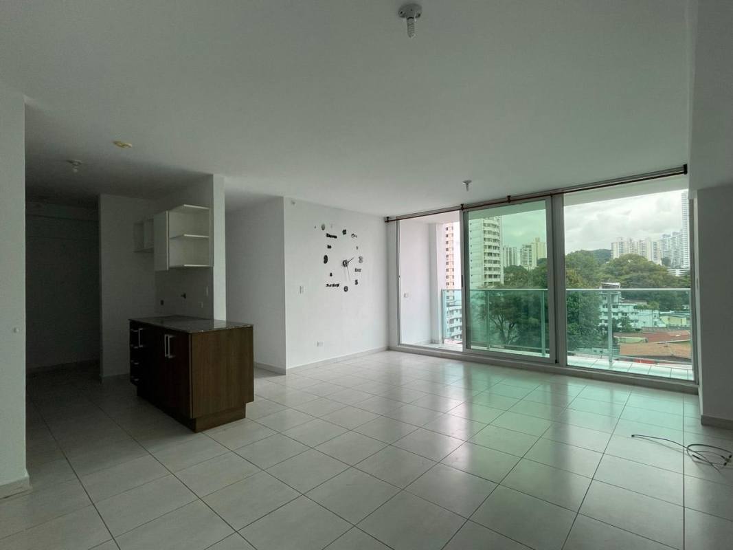 Living room with sliding glass doors to balcony PH Trinity Tower Panama City