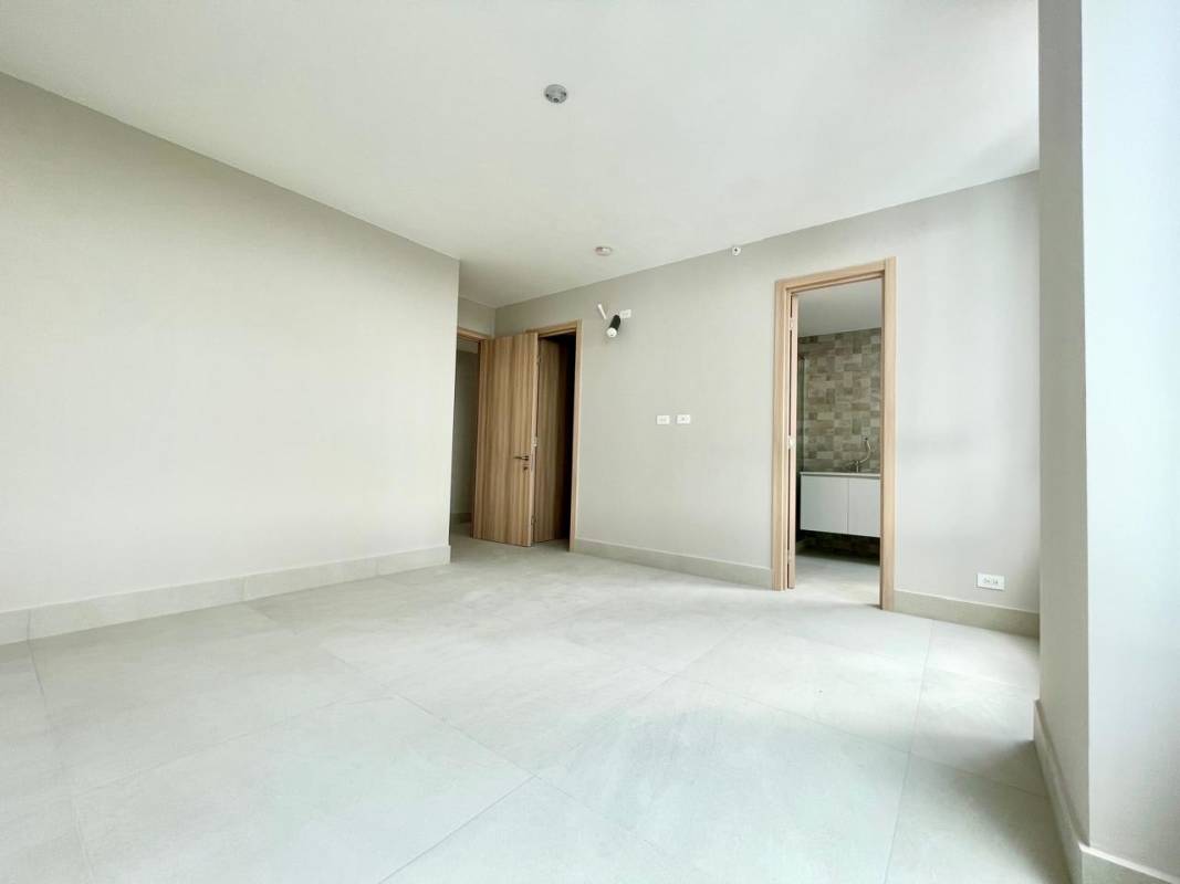 Modern yoga studio with wood floors large windows overlooking the Panama City skyline PH Riviera del Golf