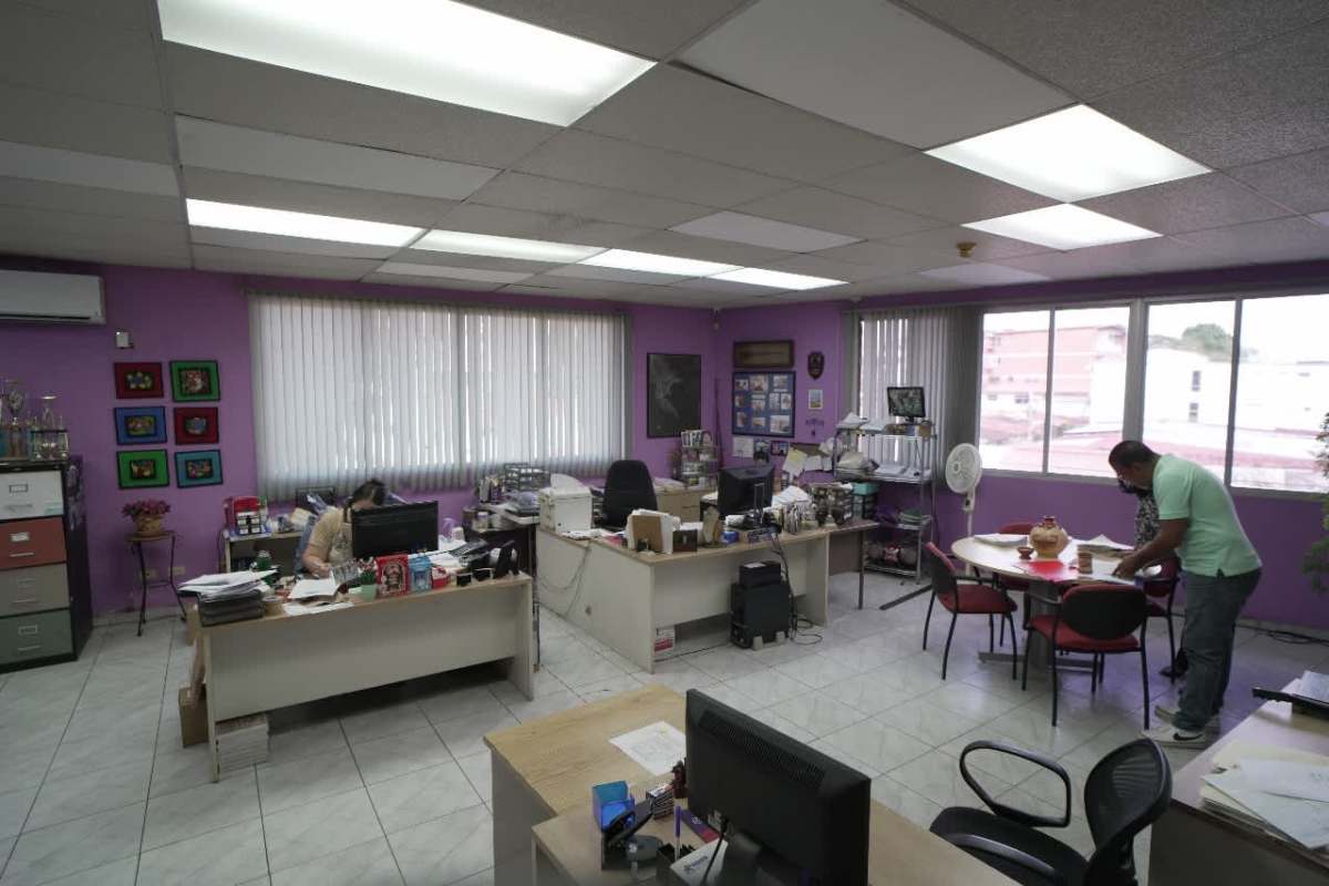 Large warehouse with metal shelving and storage boxes in commercial facility Betania Panama