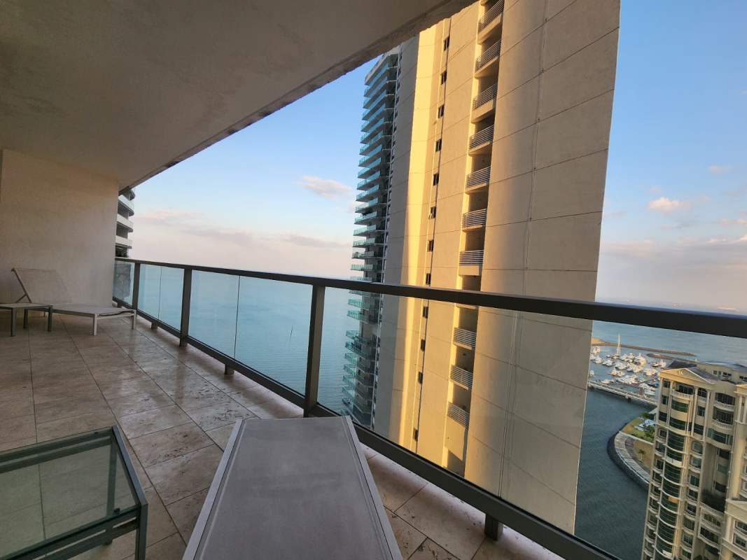 Bright living area with balcony ocean skyline views PH Trump JW Marriott Panama