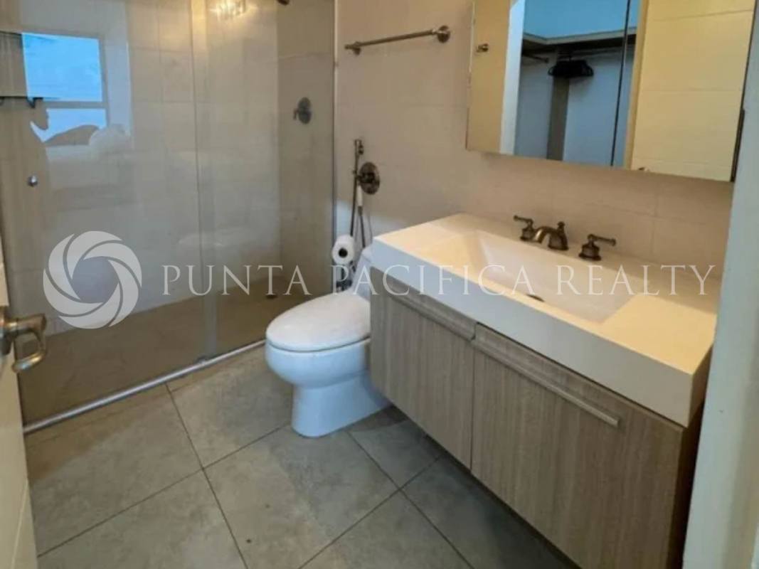 Elegant bedroom with large windows and panoramic ocean views in PH H2O on Avenida Balboa Panama City