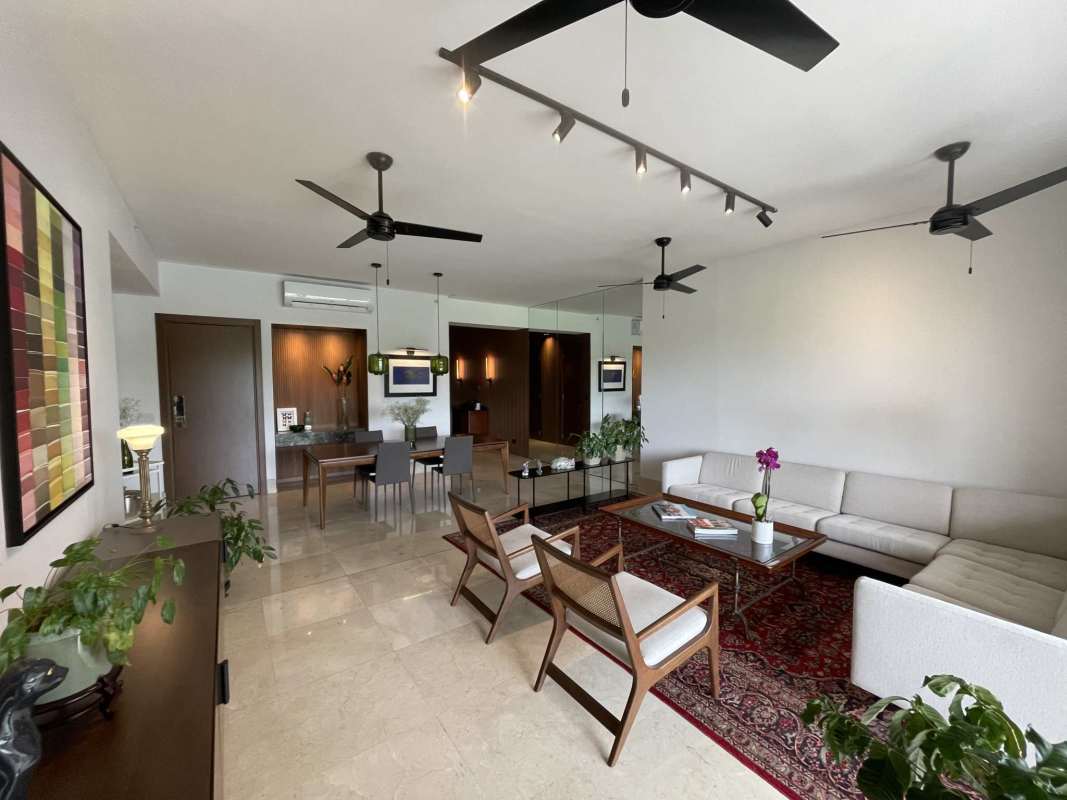 Master suite with large window, lake and golf views in luxury apartment PH The Reserve Panama