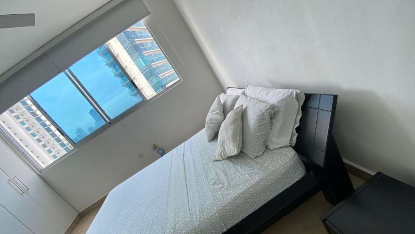 Bright living dining area with floor-to-ceiling windows at PH Vista Balboa