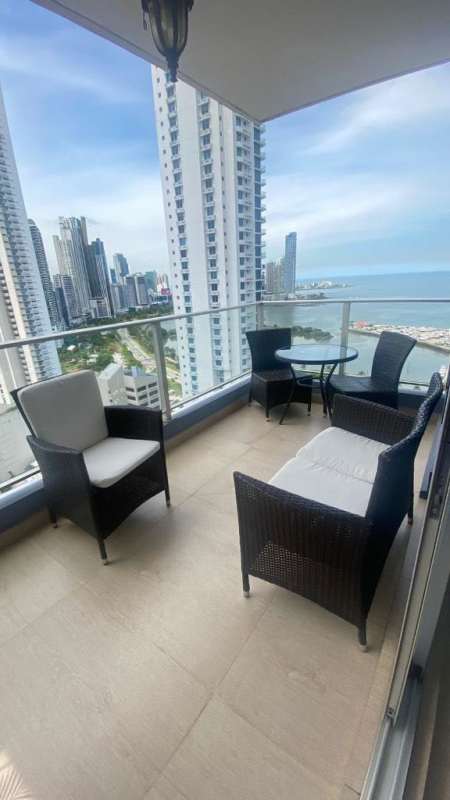 Minimalist bedroom with large window ocean view at PH Vista Balboa Panama City Panama