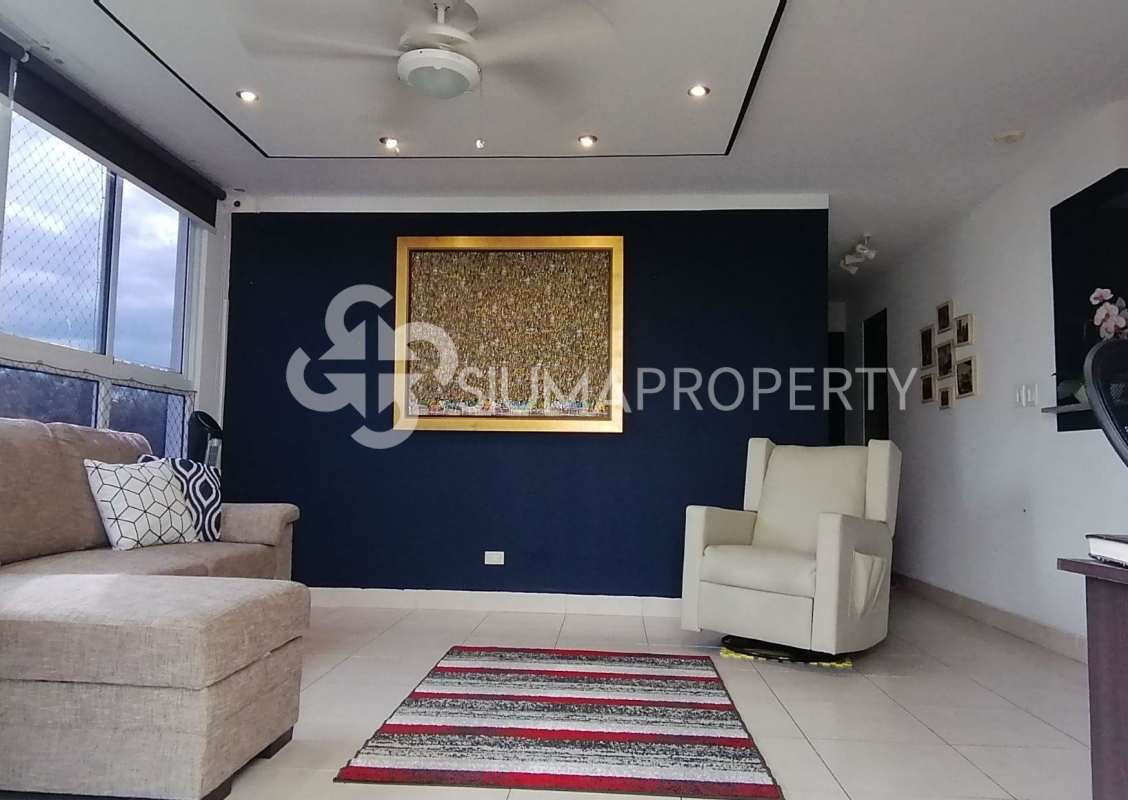 Living room with city skyline view large windows balcony PH Belview Panama