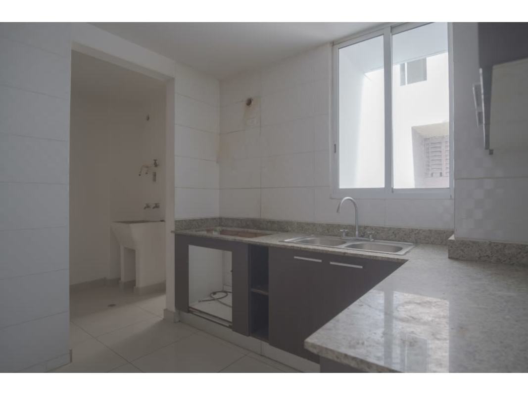 Kitchen with granite countertops, natural light and cabinetry in PH Victoria Royale Panama City