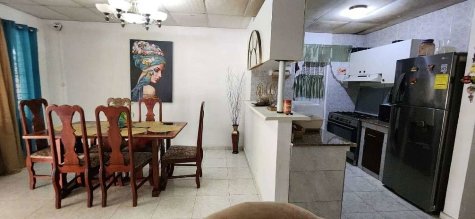Secured patio with children's toys, trampoline, tiled floor, Panama house exterior