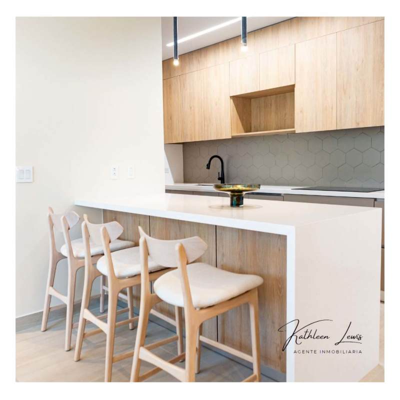 Bathroom with glass shower enclosure, floating vanity and contemporary fixtures at PH Nogal Costa del Este Panama