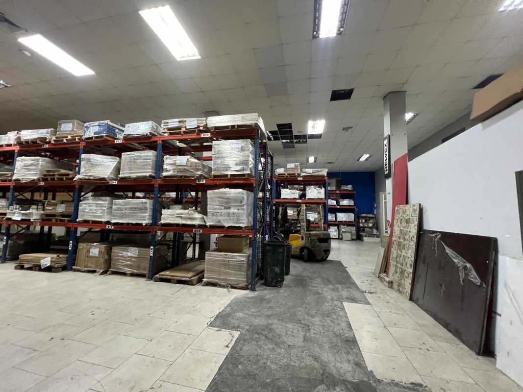 Large open warehouse with stacked materials in commercial property Panama