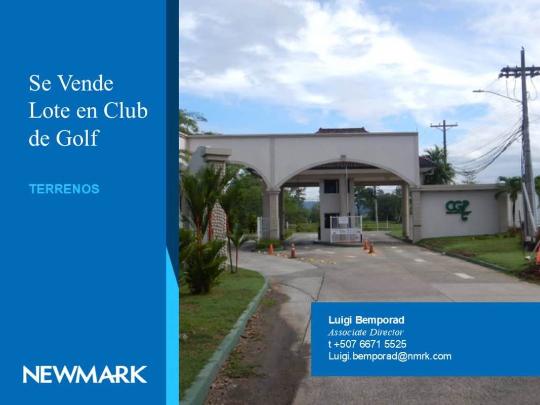 Main gated entrance to Club de Golf Panama with security booth and landscaped entryway