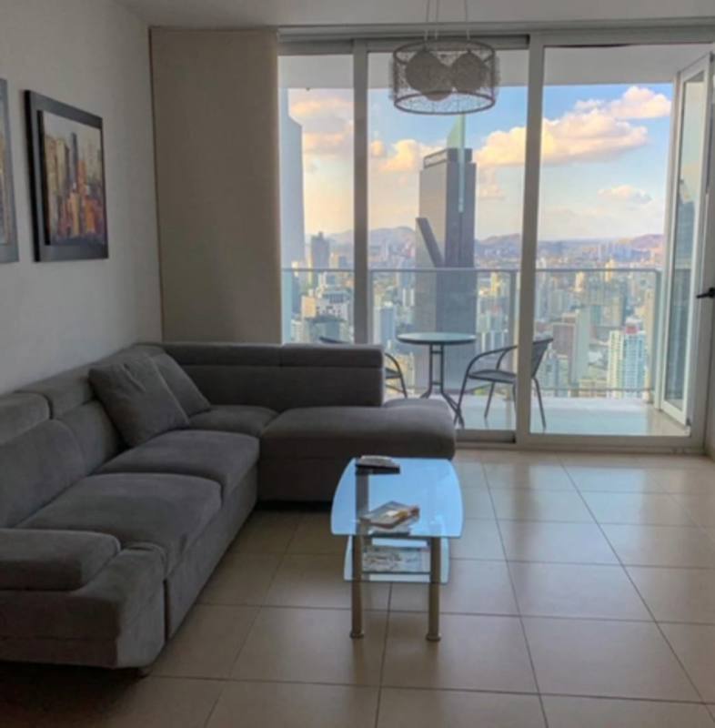 Spacious bedroom with large window and skyline views in PH Water on the Bay Panama City