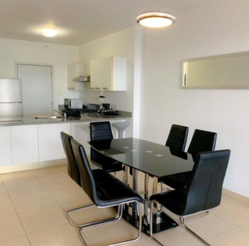 Bedroom with city skyline view in luxury apartment PH Water on the Bay Panama City