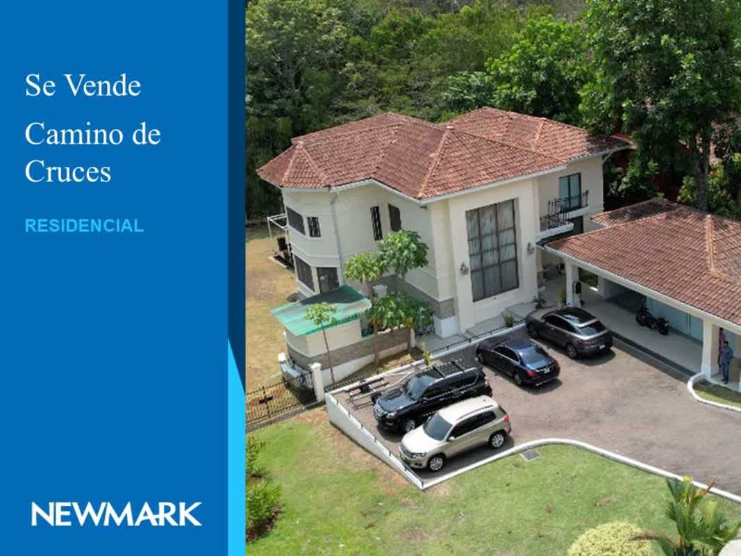 Outdoor basketball and multi-sport court surrounded by greenery in gated Camino de Cruces community Panama