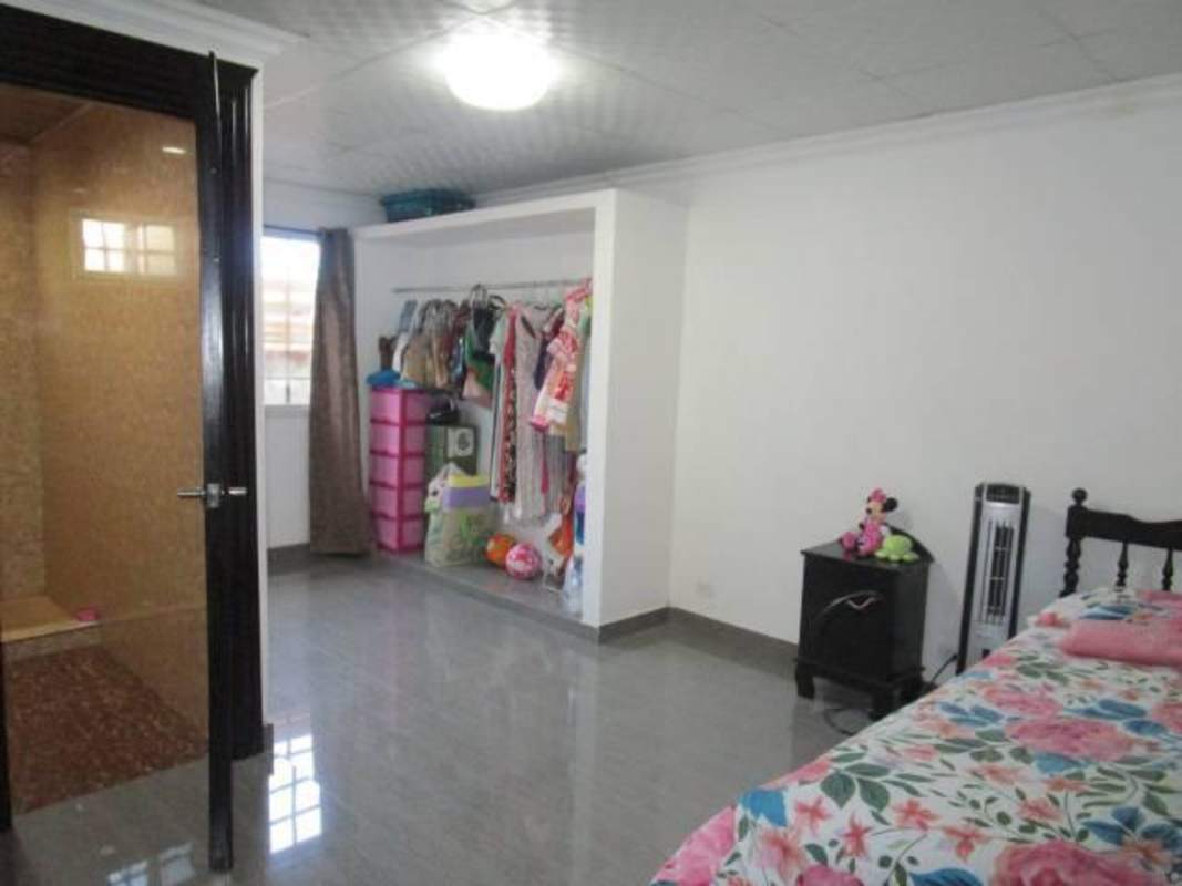 Fully tiled bathroom with shower and vanity in Brisas del Golf Tocumen Panama