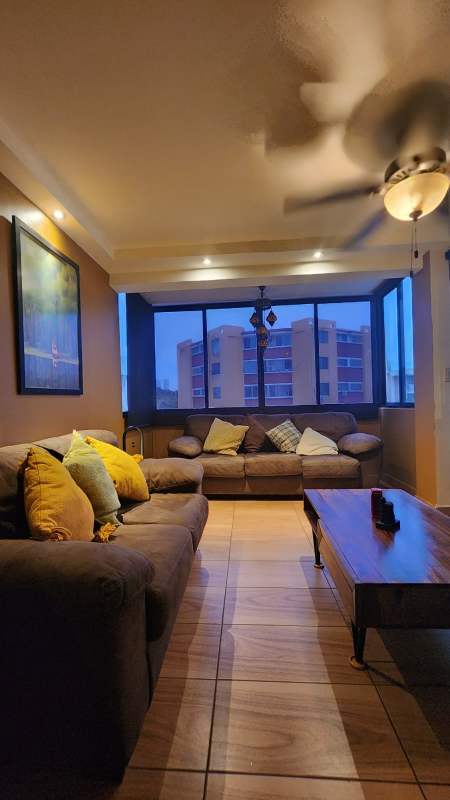 Dining space with large windows and ceramic floor in Condo El Jilguero Carrasquilla Panama City