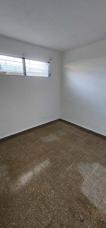 Bedroom with closet space and large window in Santa Clara house Panama