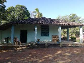 Aerial view of large farm lot with rustic house in La Candelaria near Las Tablas Panama