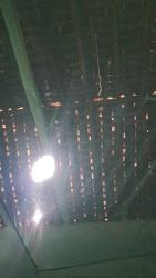 Rustic ceiling of quincha house with wooden beams and woven roofing Los Santos Panama