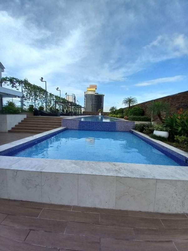 Modern ensuite master bathroom with bathtub and separate shower at PH Rivage Panama