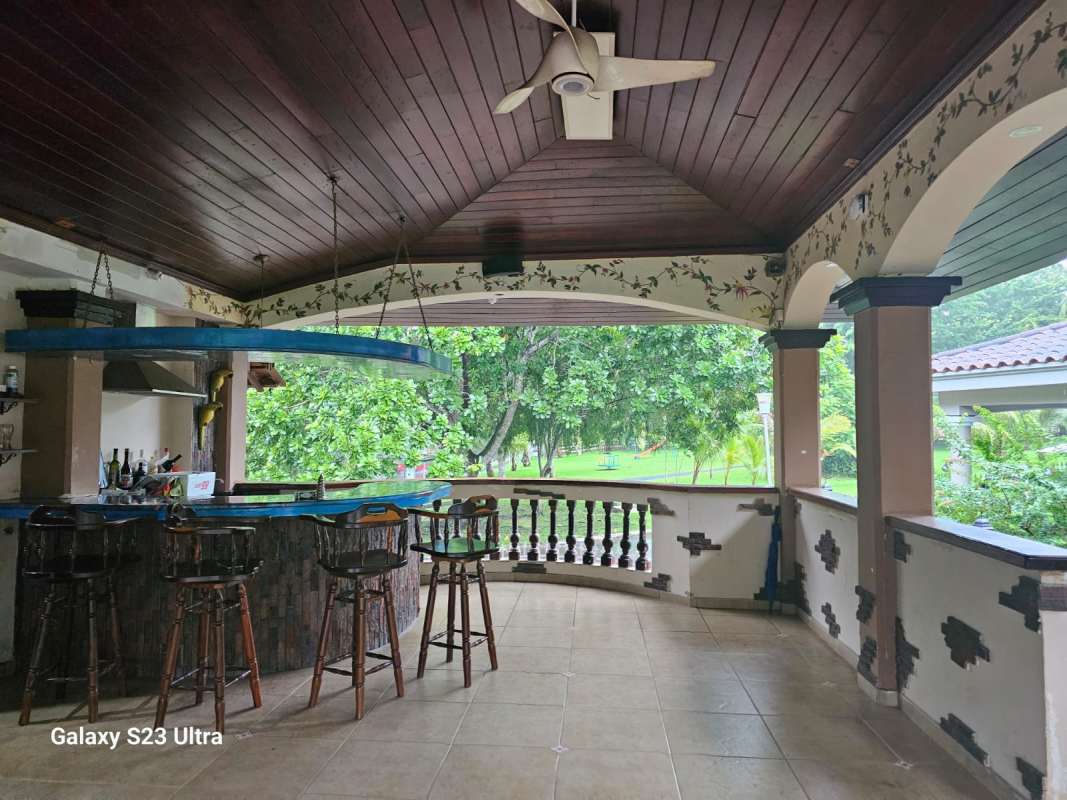 Covered rear patio terrace with Mediterranean arches outdoor bar garden in Albrook Panama