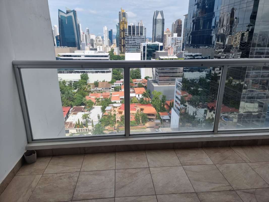 Bedroom featuring city views, large windows, tile floor, AC in PH Obarrio Tower Panama
