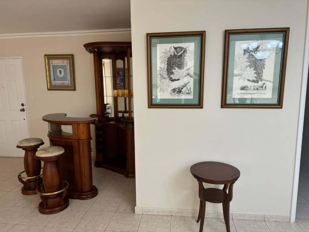 Modern bathroom with glass shower and granite top vanity in PH Destiny Tower