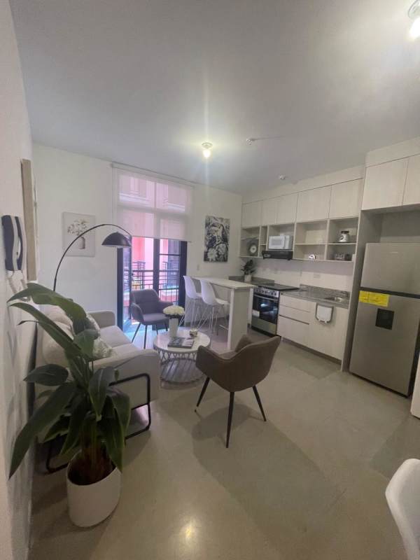 Modern open living dining area with balcony access in Casa Korsi Santa Ana Panama