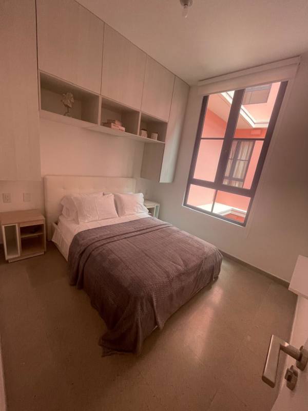 Minimalist bedroom with natural light and built-in storage Casa Korsi Panama