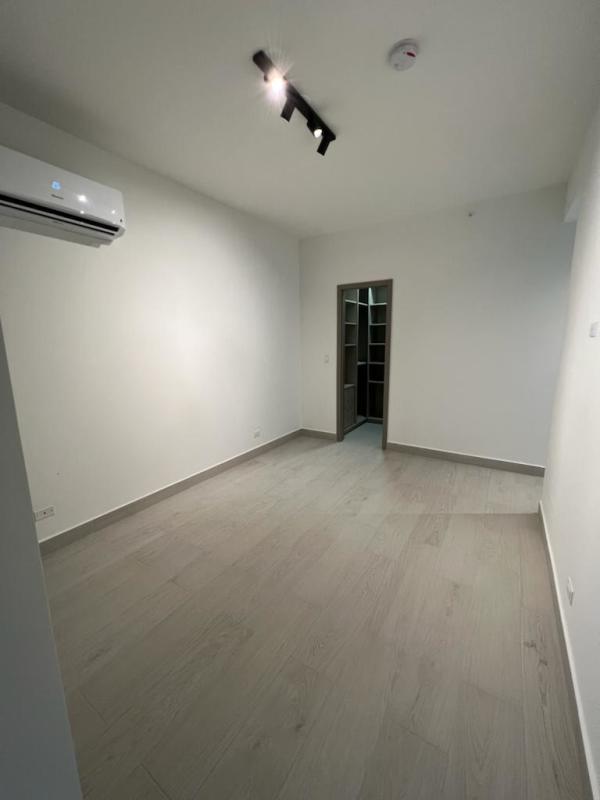 Modern bathroom with glass shower enclosure, floating vanity and quality fixtures PH Urbana Panama