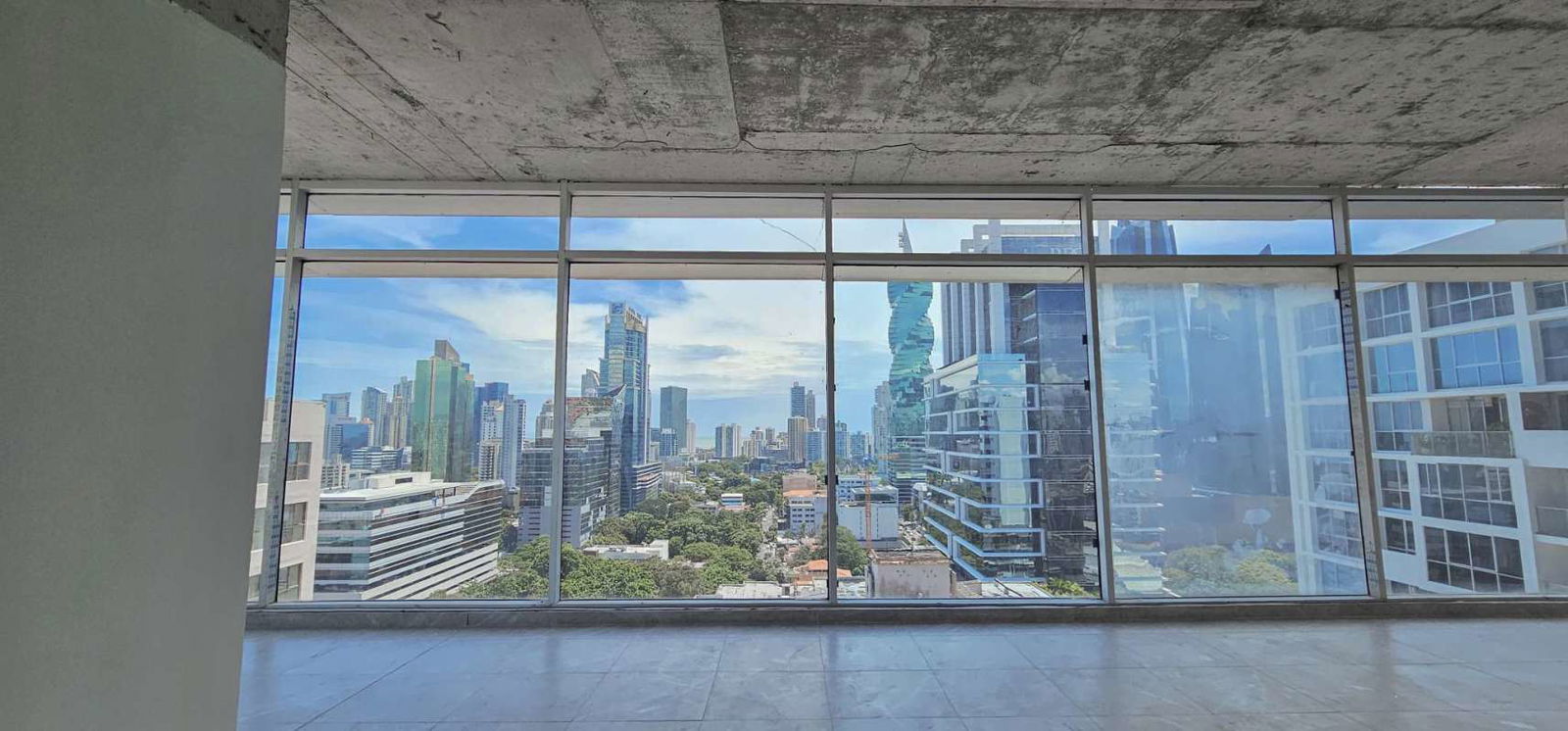 City skyline view from large office at Sortis Business Tower financial hub Panama City