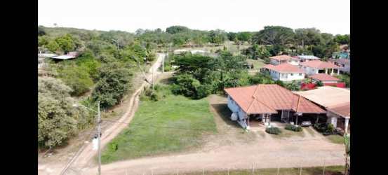 Aerial of El Guayabo neighborhood with residential plots, greenery and dirt roads in Herrera Province Panama