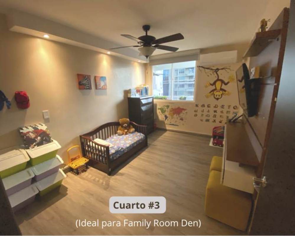 Child-friendly bedroom with playful murals, large window and ample natural lighting PH Sunrise Tower Panama