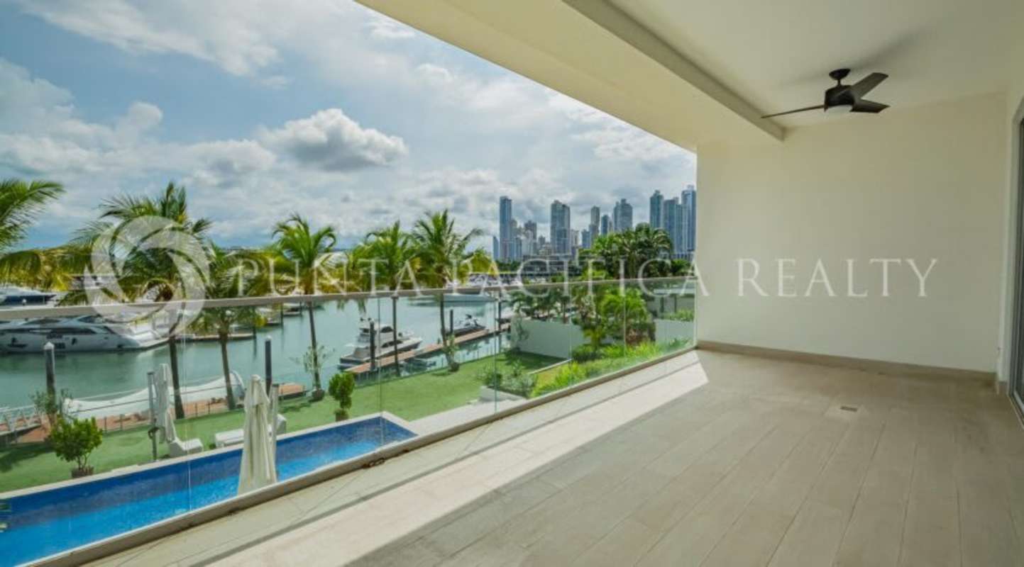 Modern balcony with city skyline and marina overlooking Pacific Ocean in Ocean Reef Islands Panama