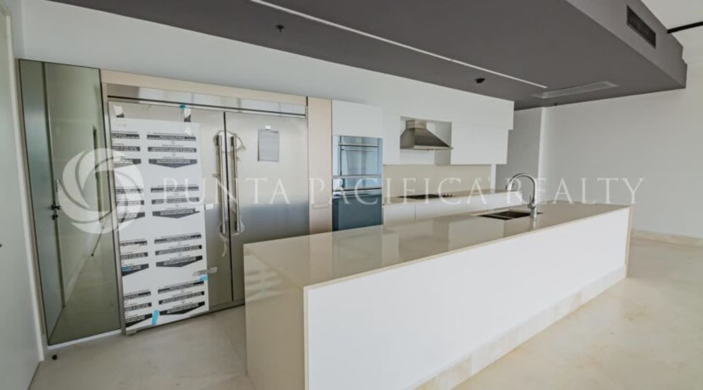 Contemporary kitchen island, stainless steel appliances, minimalist cabinets Ocean Reef Panama