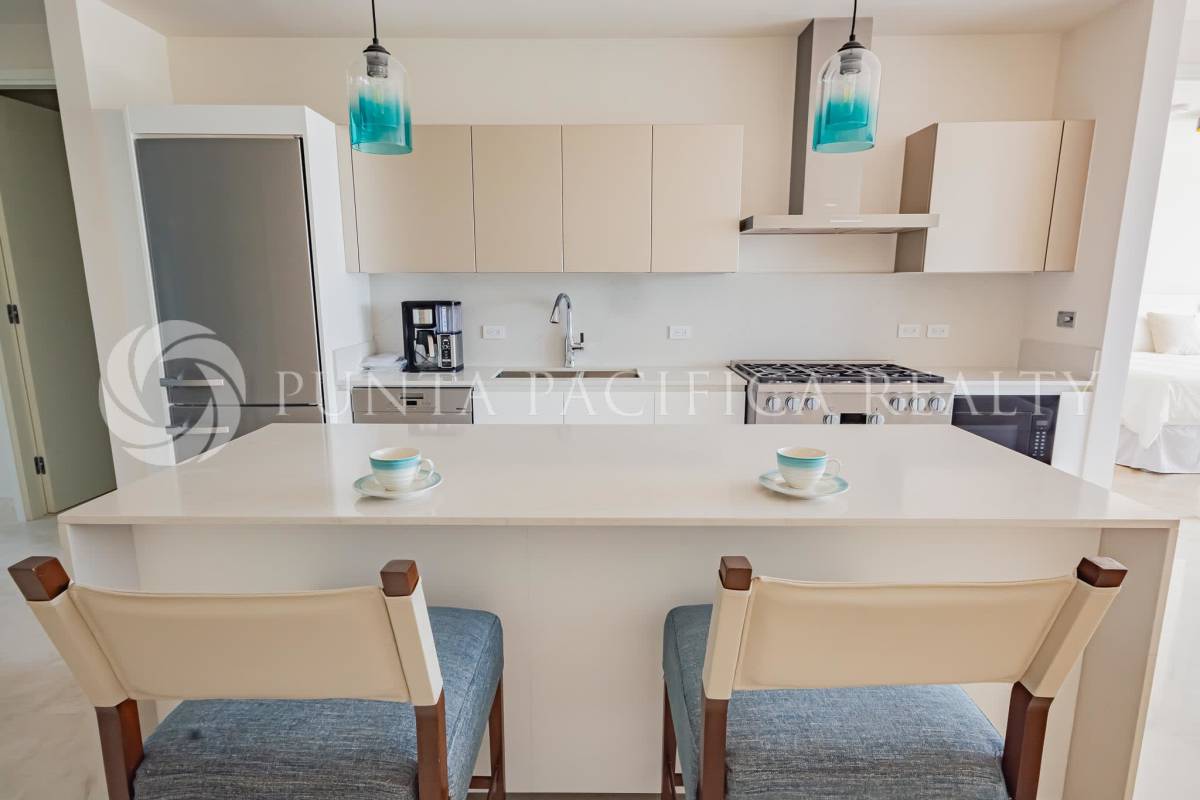 Modern bathroom with glass shower and stone vanity in Seascape Tower Ocean Reef Panama