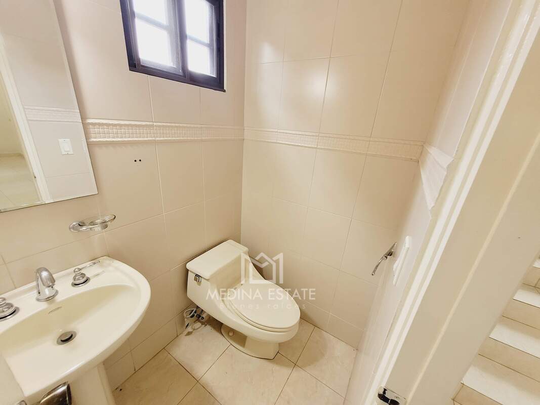 Spacious patio with ceiling fans and views over mature garden in Clayton Panama