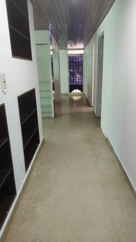 Open interior room with ceiling fan and tile floor commercial space Panama City